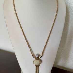 Gold Tone Pendant Necklace with Cream Stone & Tassel Detail